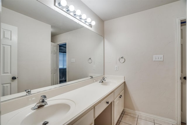 bathroom with vanity and tile patterned floors