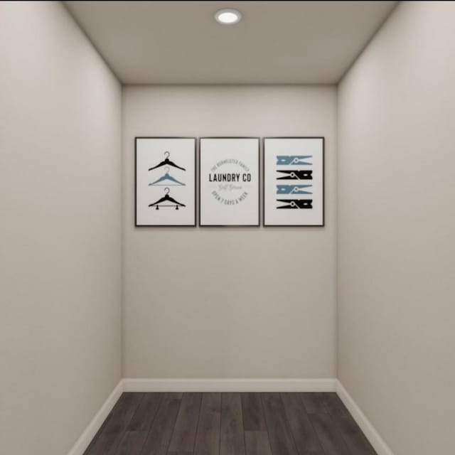 unfurnished room featuring dark hardwood / wood-style flooring