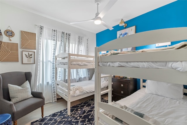 bedroom featuring ceiling fan and hardwood / wood-style floors