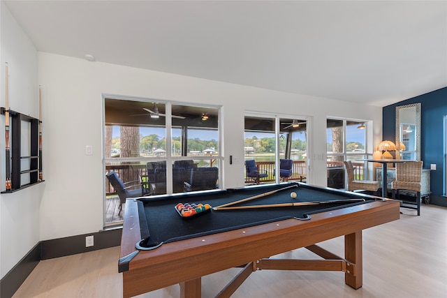 rec room featuring hardwood / wood-style flooring, ceiling fan, and pool table