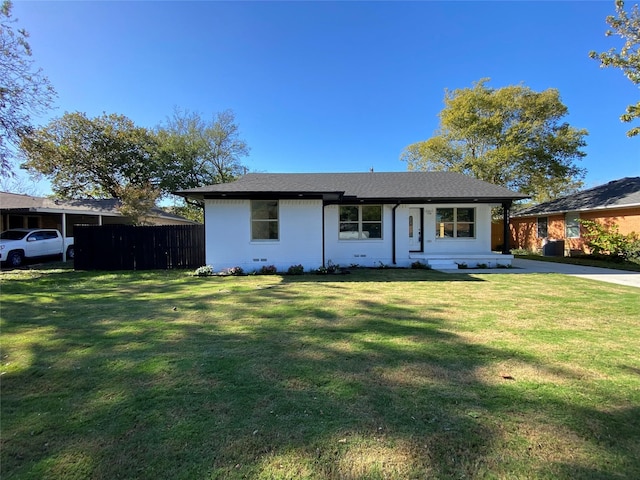 ranch-style house with a front lawn