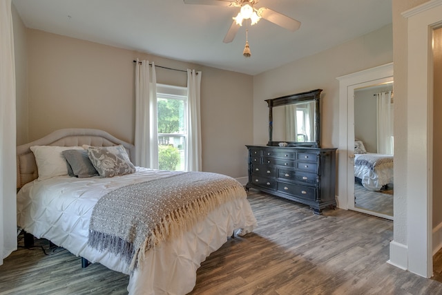 bedroom featuring ceiling fan and wood-type flooring