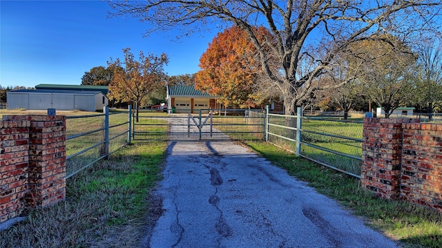 view of gate featuring a rural view