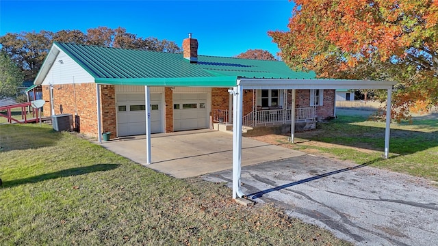 single story home featuring a front lawn, a garage, a carport, and cooling unit