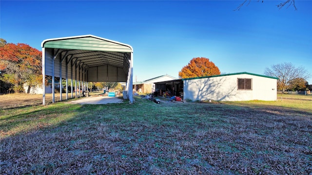 view of yard with a carport