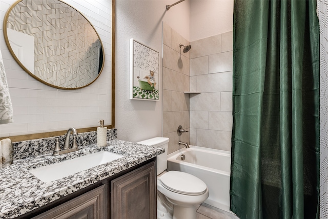 full bathroom with vanity, toilet, and shower / bath combo with shower curtain