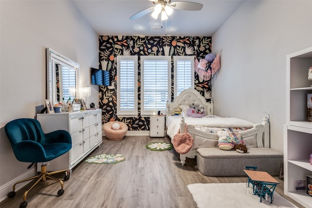 bedroom featuring ceiling fan and light wood-type flooring