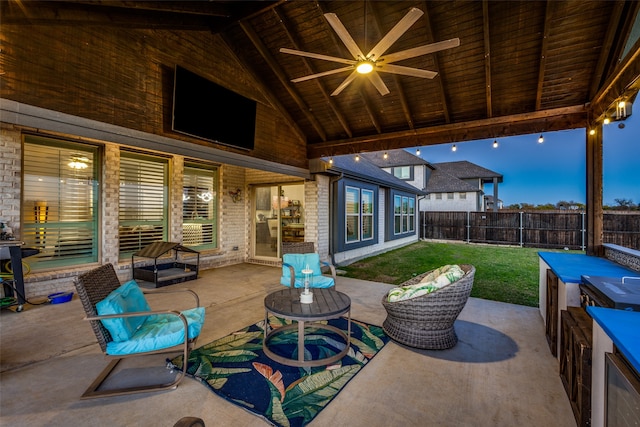 view of patio featuring ceiling fan