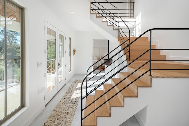 stairway with french doors