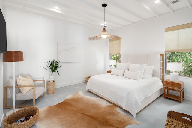 bedroom featuring beamed ceiling