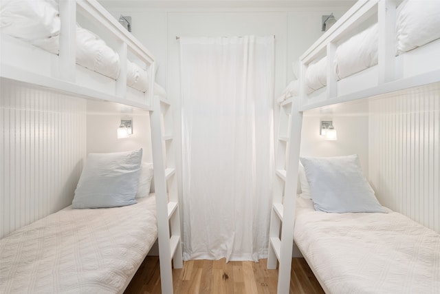 bedroom featuring wood-type flooring