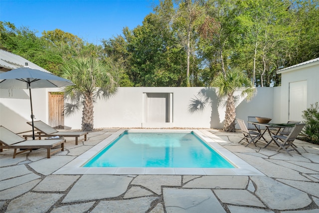 view of pool with a patio