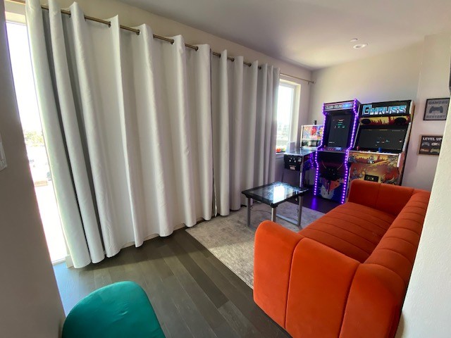 living room featuring dark hardwood / wood-style flooring