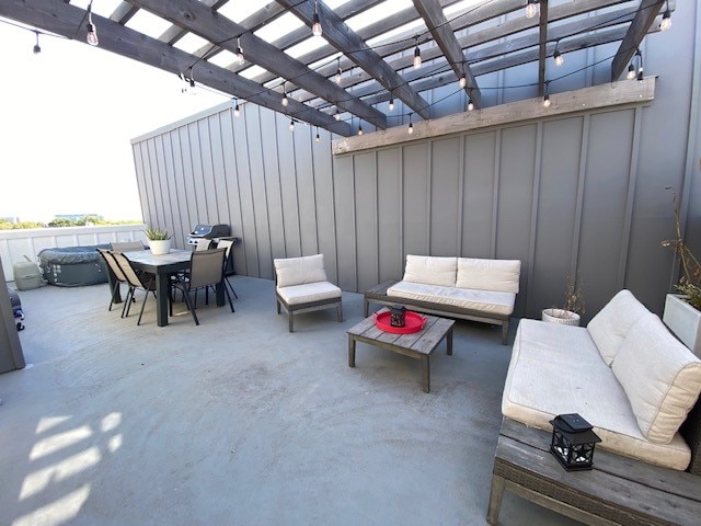 view of patio with outdoor lounge area, a pergola, and a hot tub