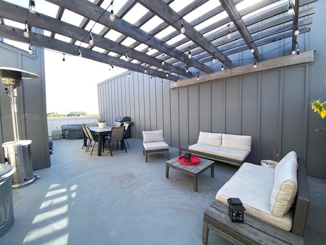 view of patio with outdoor lounge area and a pergola