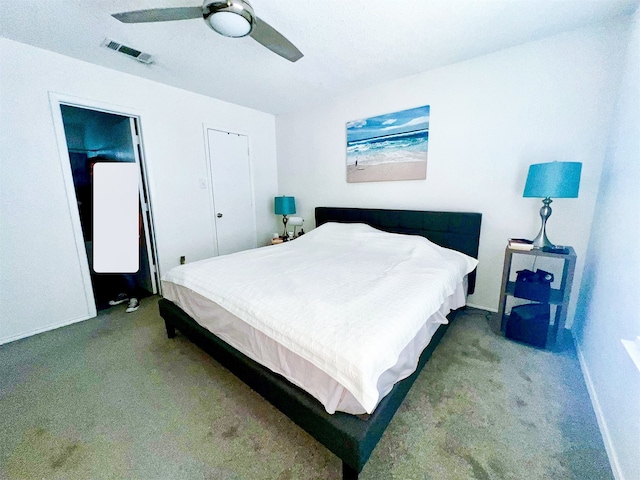 bedroom with ceiling fan and carpet