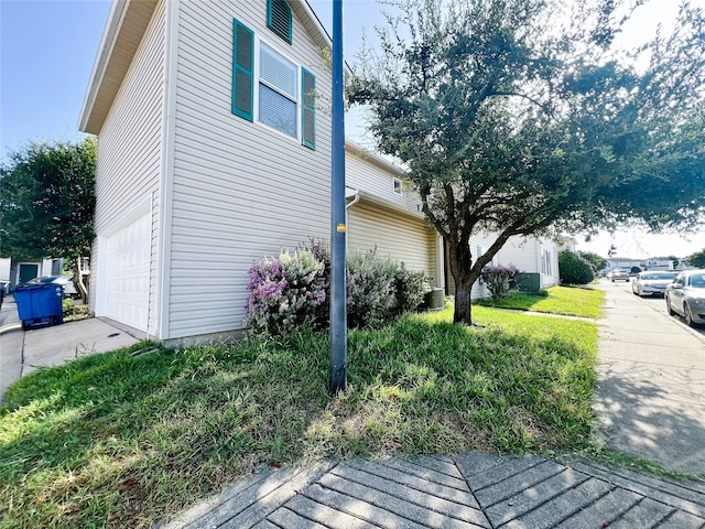 view of home's exterior with a garage