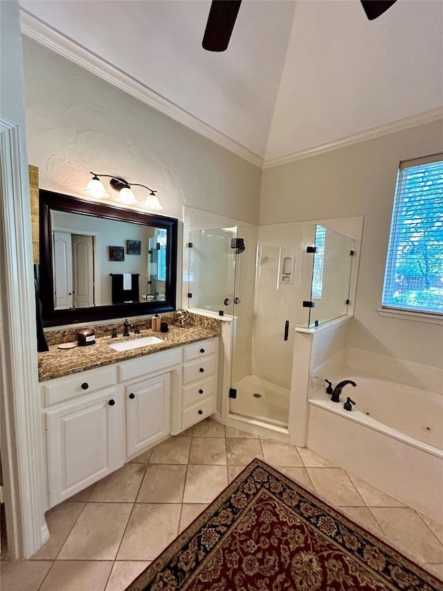 bathroom with vanity, crown molding, independent shower and bath, tile patterned flooring, and lofted ceiling