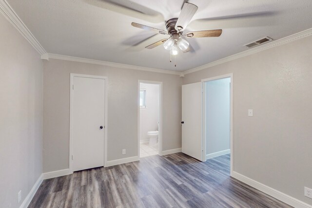 bathroom featuring vanity, toilet, and wood-type flooring