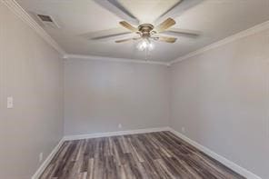 unfurnished room featuring dark hardwood / wood-style flooring and ornamental molding