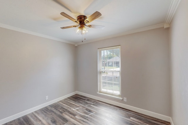 unfurnished room featuring a ceiling fan, ornamental molding, baseboards, and wood finished floors