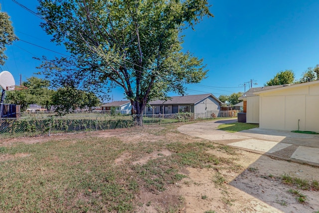 view of yard featuring a patio area and fence