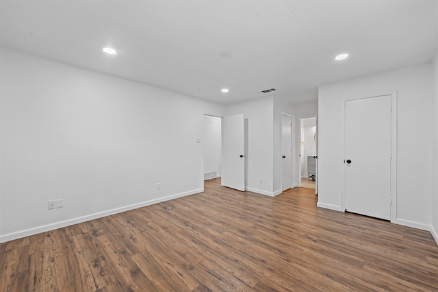 unfurnished bedroom featuring hardwood / wood-style floors