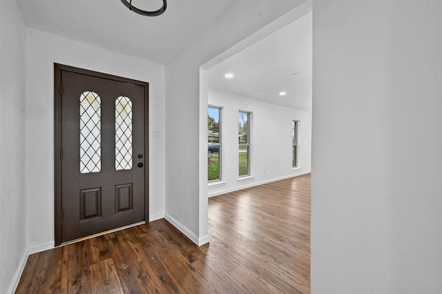 unfurnished dining area with hardwood / wood-style flooring and sink