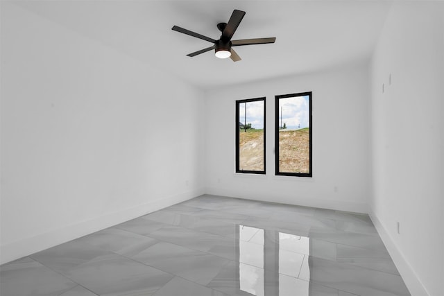 unfurnished room featuring ceiling fan