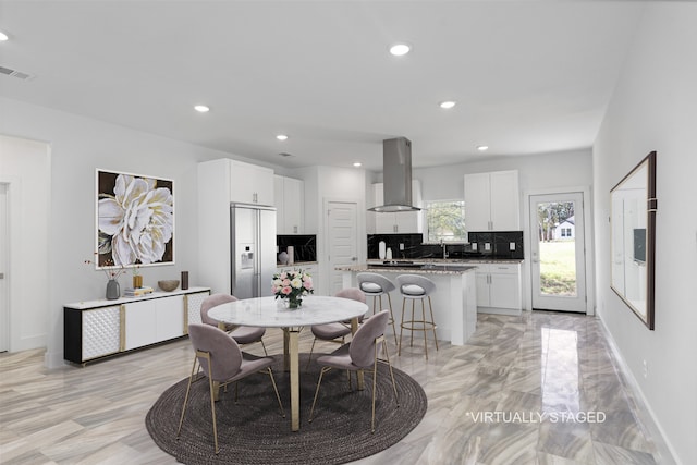 dining area featuring sink