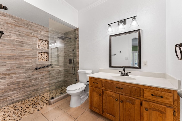 full bathroom featuring vanity, crown molding, toilet, and a walk in shower