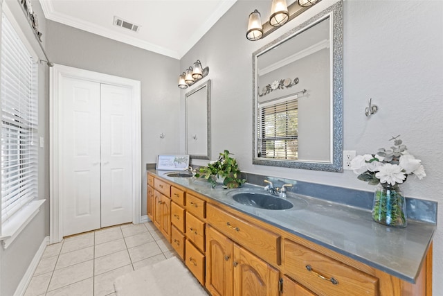 full bathroom with tile patterned floors, visible vents, ornamental molding, and a sink