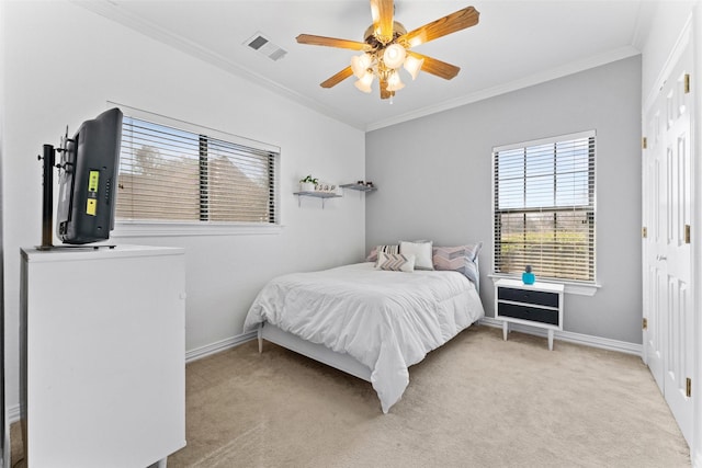 bedroom featuring visible vents, light carpet, baseboards, and ornamental molding