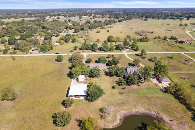 aerial view with a water view and a rural view