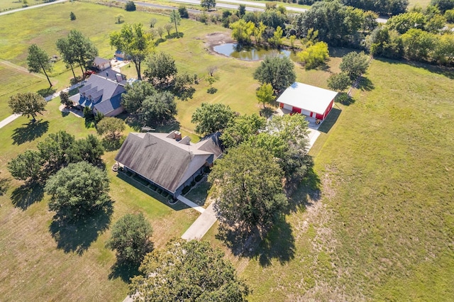 aerial view with a rural view and a water view