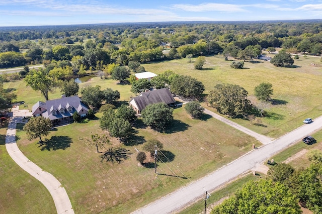 drone / aerial view with a rural view and a forest view