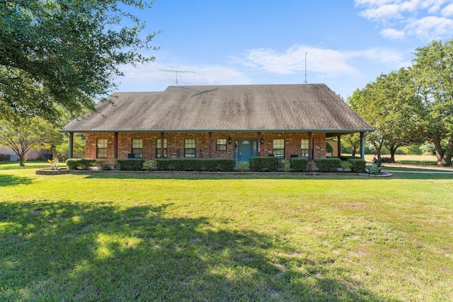 view of property's community with a lawn