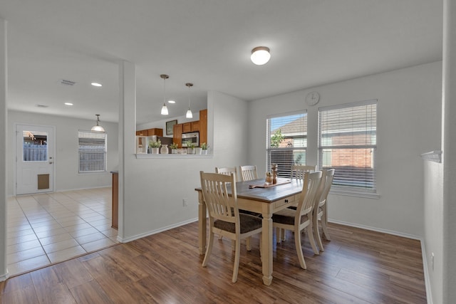 dining room featuring light hardwood / wood-style floors