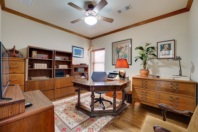 office area with wood-type flooring, ceiling fan, and crown molding