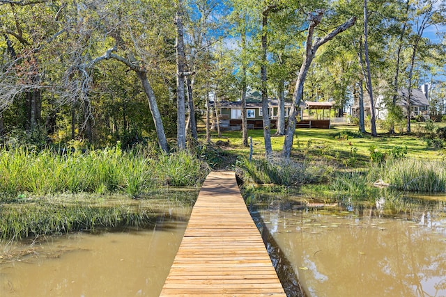 view of dock with a water view