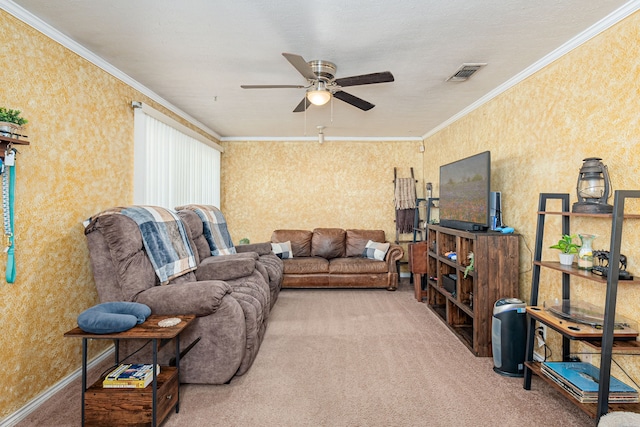 carpeted living room featuring crown molding and ceiling fan