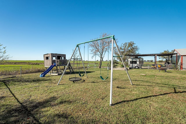 view of play area featuring a lawn