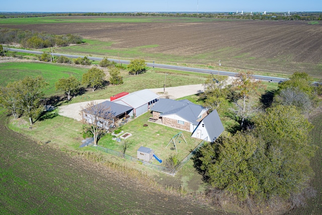 birds eye view of property featuring a rural view