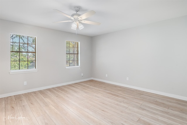 spare room with plenty of natural light and light wood-type flooring