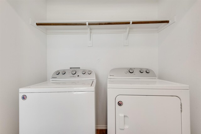 washroom featuring independent washer and dryer