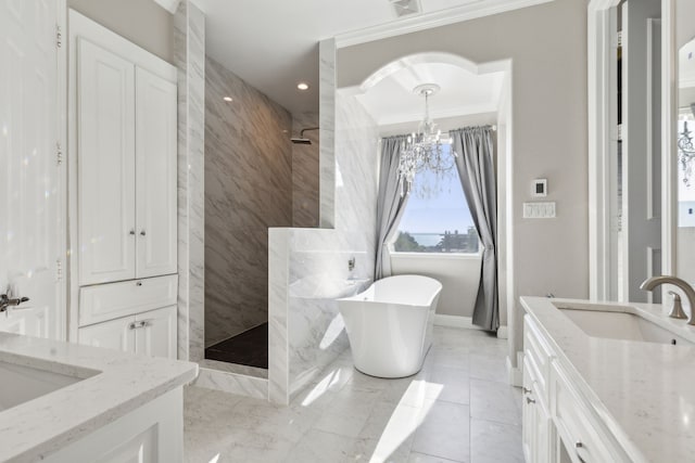 bathroom with vanity, crown molding, independent shower and bath, and a chandelier