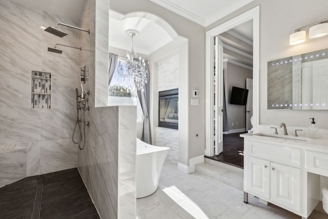 bathroom featuring vanity, an inviting chandelier, independent shower and bath, and crown molding