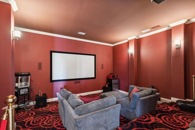 cinema featuring carpet flooring and crown molding