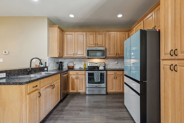 kitchen with light brown cabinets, sink, appliances with stainless steel finishes, tasteful backsplash, and dark hardwood / wood-style flooring