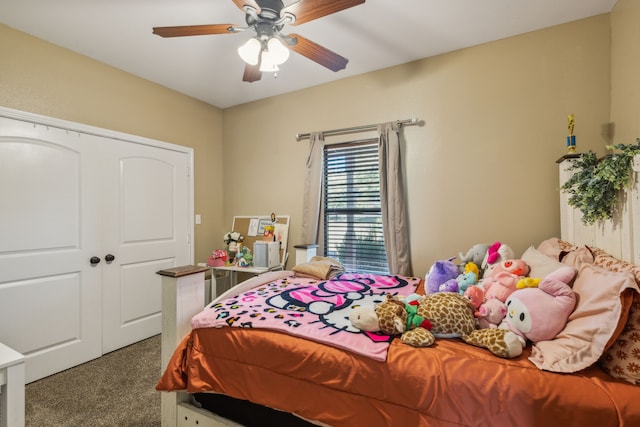 bedroom featuring ceiling fan, a closet, and carpet floors